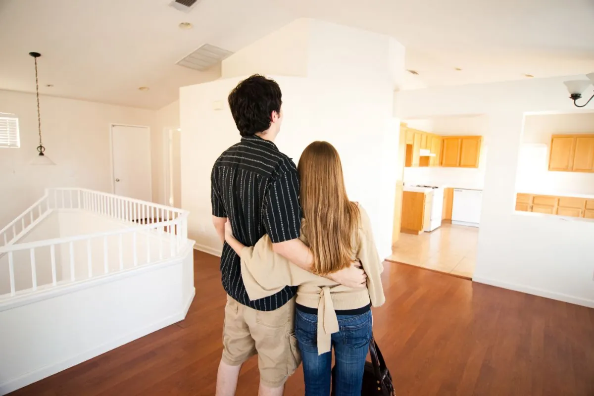 a couple looking at home interior