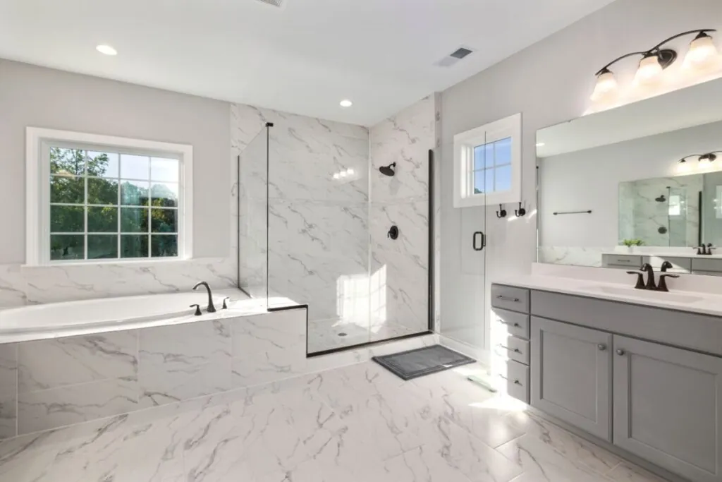 a white luxury new remodeled bathroom