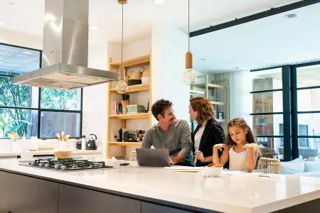 happy family in luxury kitchen island