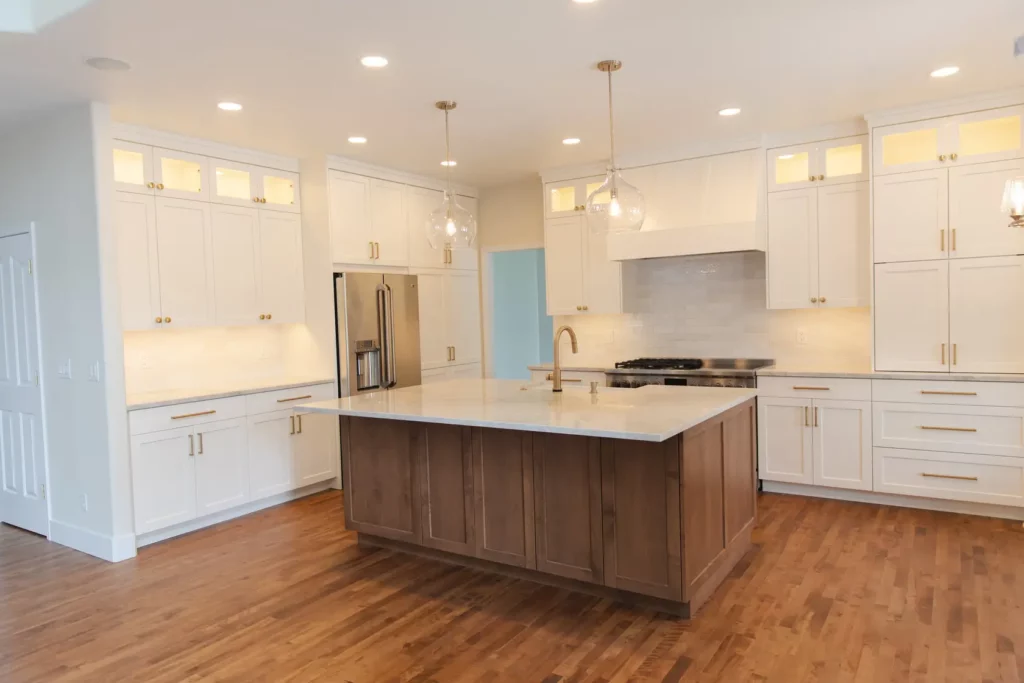Remodeled kitchen with an island and bar seating